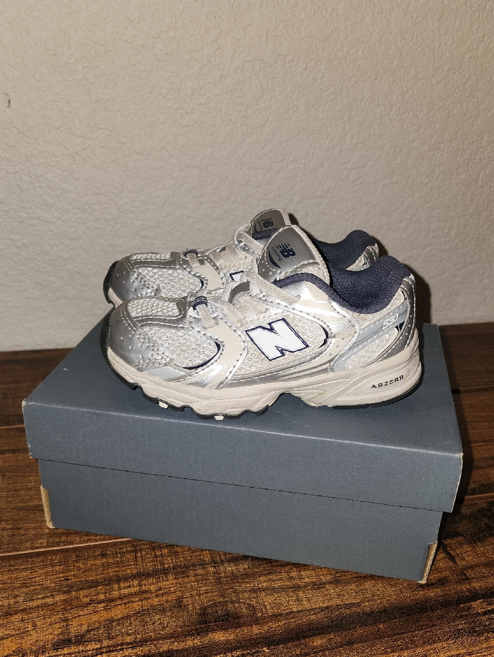 New Balance Kids Silver and Navy Athletic Sneakers